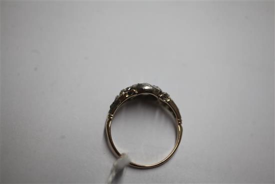 A Georgian gold, silver and diamond set cluster ring, size M/N.